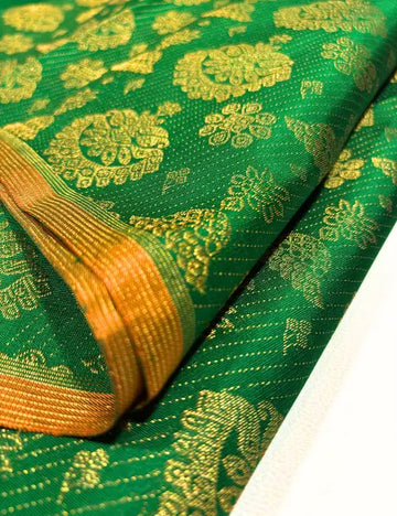 Borderless Green Kanchipuram Silk Saree with Gold Jimikki Motifs & Grand Orange Pallu