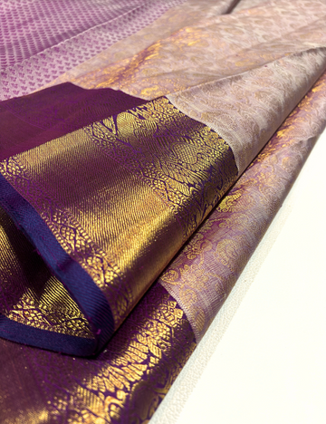 Pastel Magenta Kanchipuram Handloom Silk Saree with Violet Border & Gold Zari Peacock Motifs