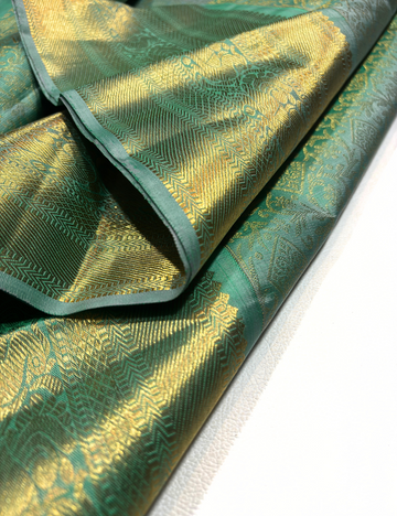 Sea Green Kanchipuram Silk Saree with Gold Zari Border and Pallu