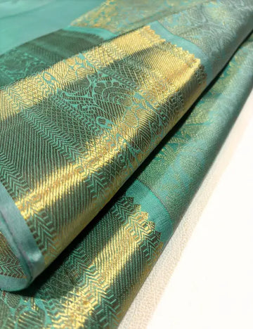 Majestic Sea Green Kanchipuram Handloom Silk Saree with Floral Peacock Motifs