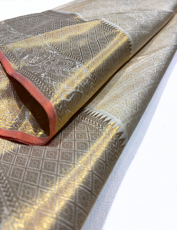 Off-White Kanchipuram Silk Saree – Gold Zari Peacock & Elephant Motifs | Traditional Elegance