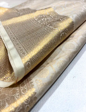 Elegant Off-White Kanchipuram Handloom Silk Saree with Gold Zari Weaving
