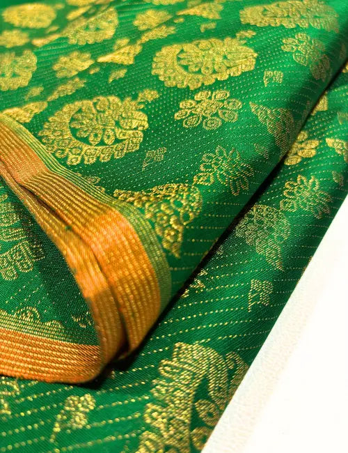 Borderless Green Kanchipuram Silk Saree with Gold Jimikki Motifs & Grand Orange Pallu