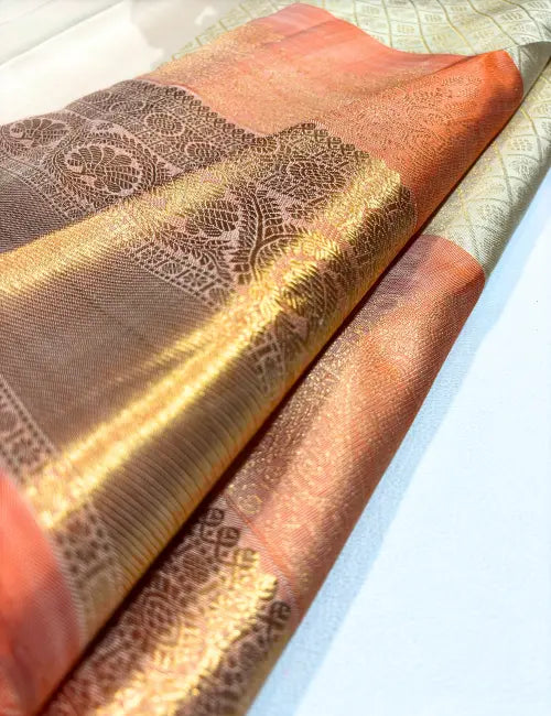 Off-White & Pastel Orange Kanchipuram Handloom Silk Saree with Peacock & Chakra Motifs