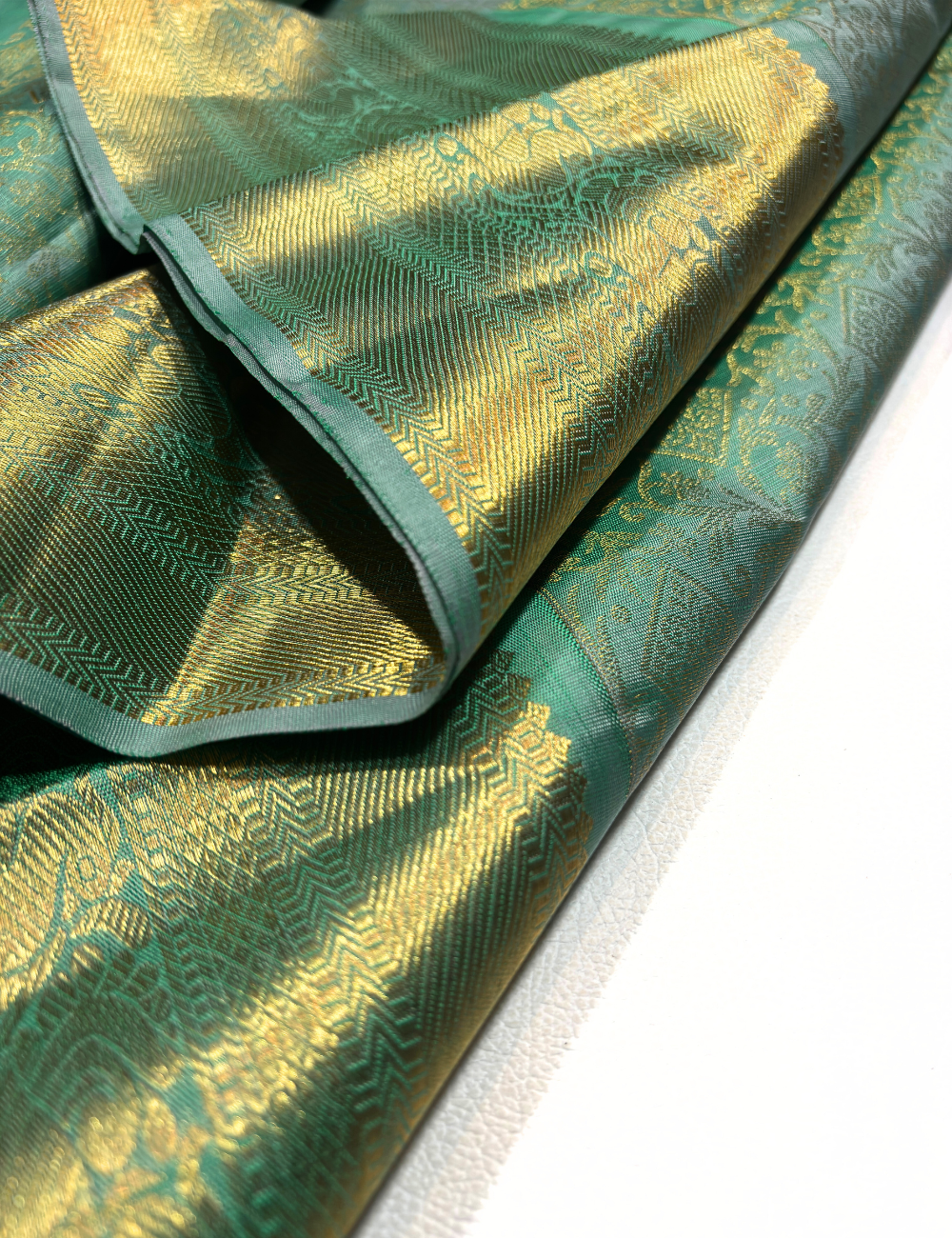 Sea Green Kanchipuram Silk Saree with Gold Zari Border and Pallu