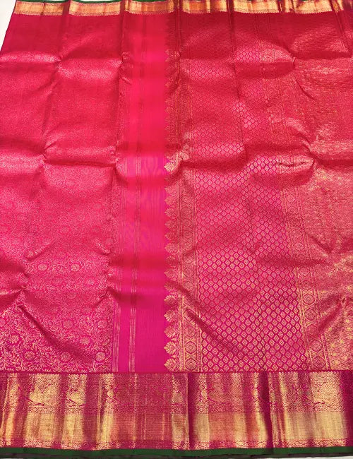 Rose Pink Kanchipuram Silk Saree with Gold Peacock Zari & Green Edges