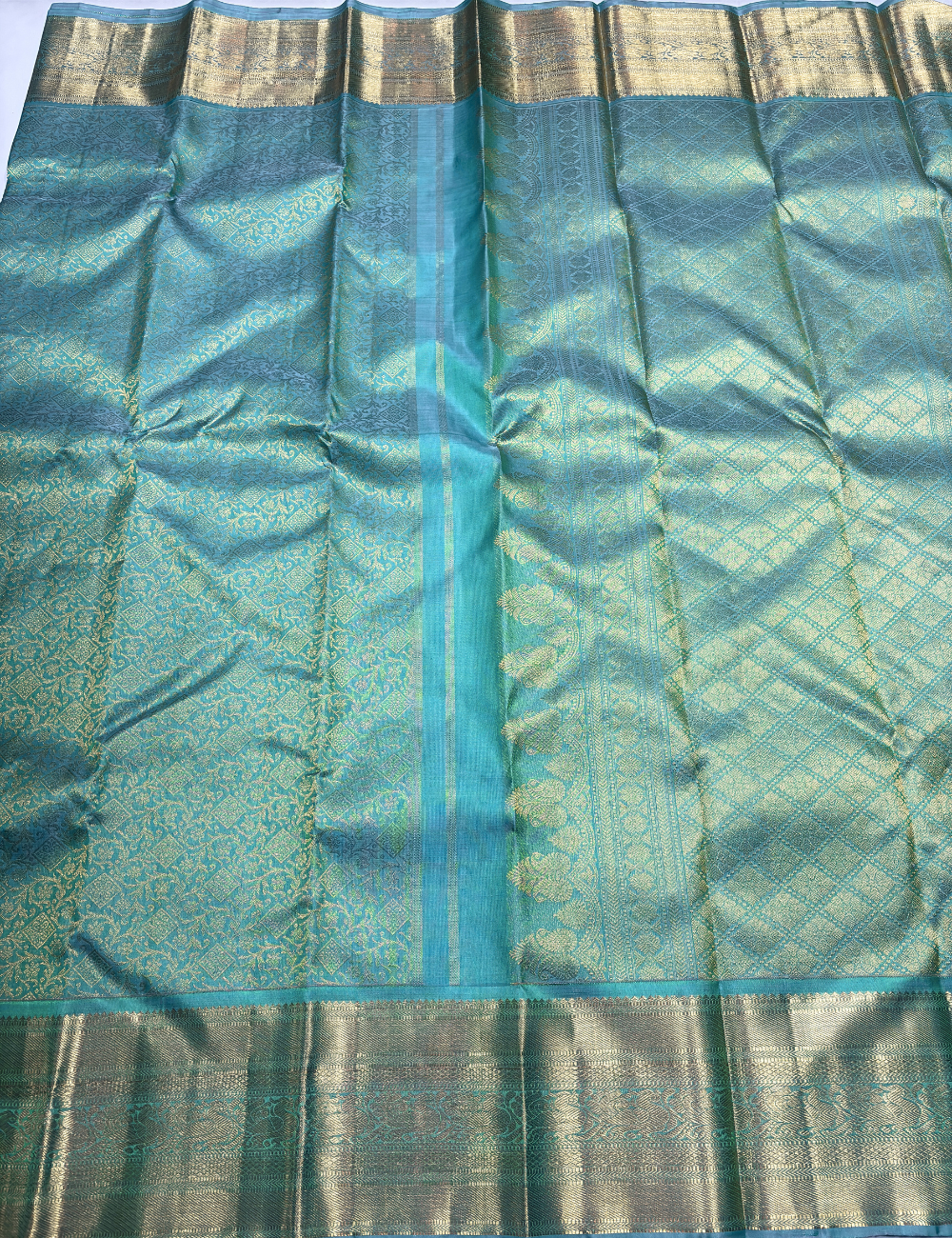 Sea Green Kanchipuram Silk Saree with Gold Zari Border and Pallu
