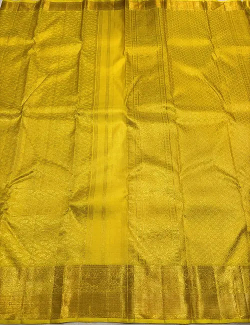 Lemon Yellow Kanchipuram Handloom Silk Saree with Gold Zari Chakra Motifs