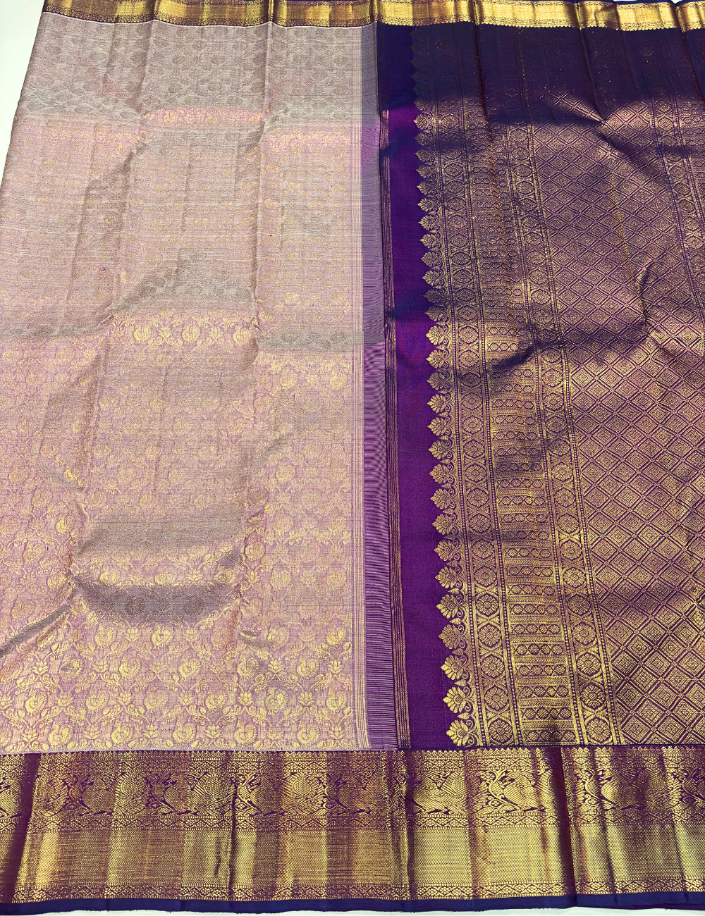 Pastel Magenta Kanchipuram Handloom Silk Saree with Violet Border & Gold Zari Peacock Motifs