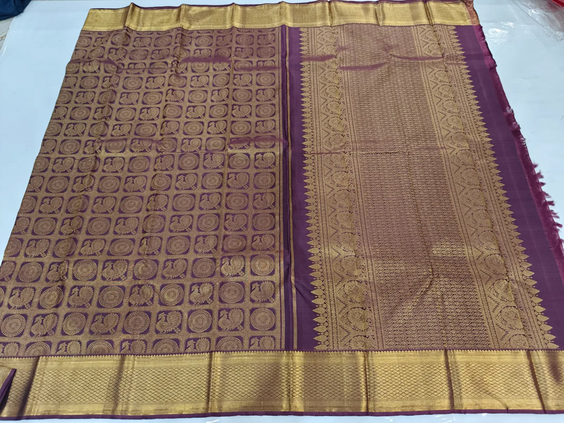 Elegant Mauve Purple Silk Saree with Chakra & Checked Zari Design