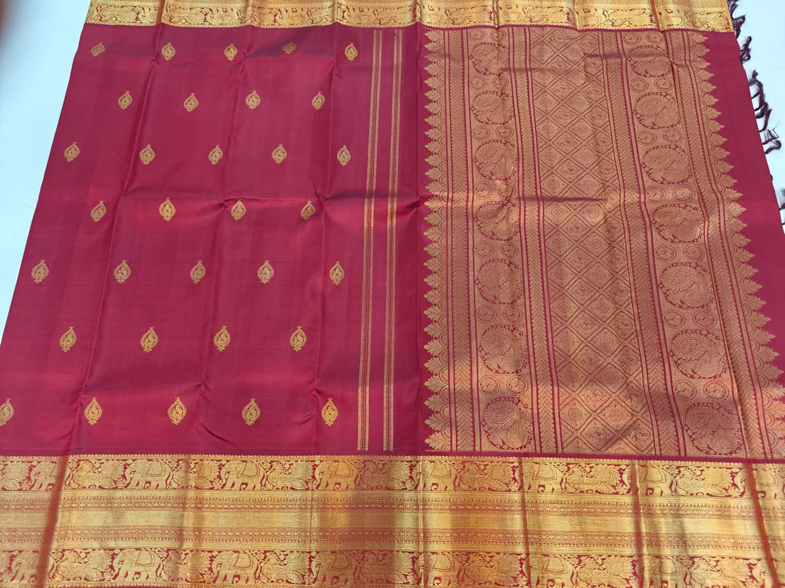Maroon Body with Paisley Butti, Elephant Zari Border & Grand Pallu