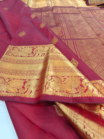 Maroon Body with Paisley Butti, Elephant Zari Border & Grand Pallu
