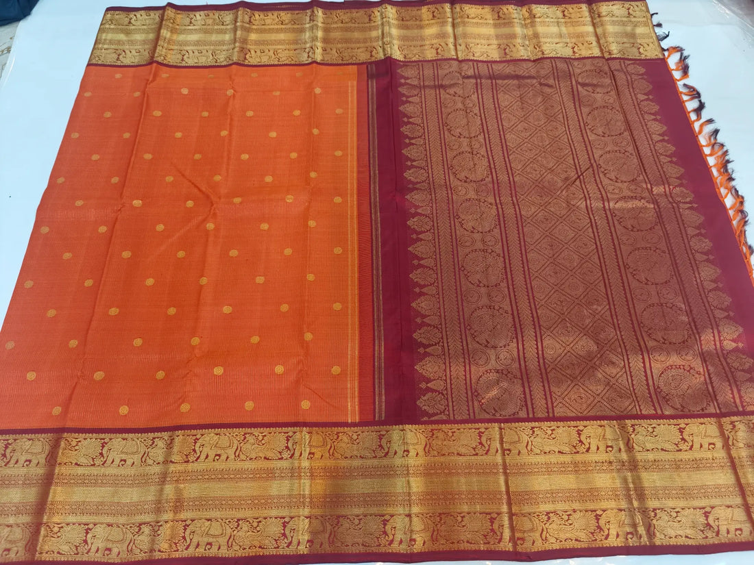 Orange Kanchipuram Silk Saree with Gold Zari Elephant Border & Traditional Motif Pallu